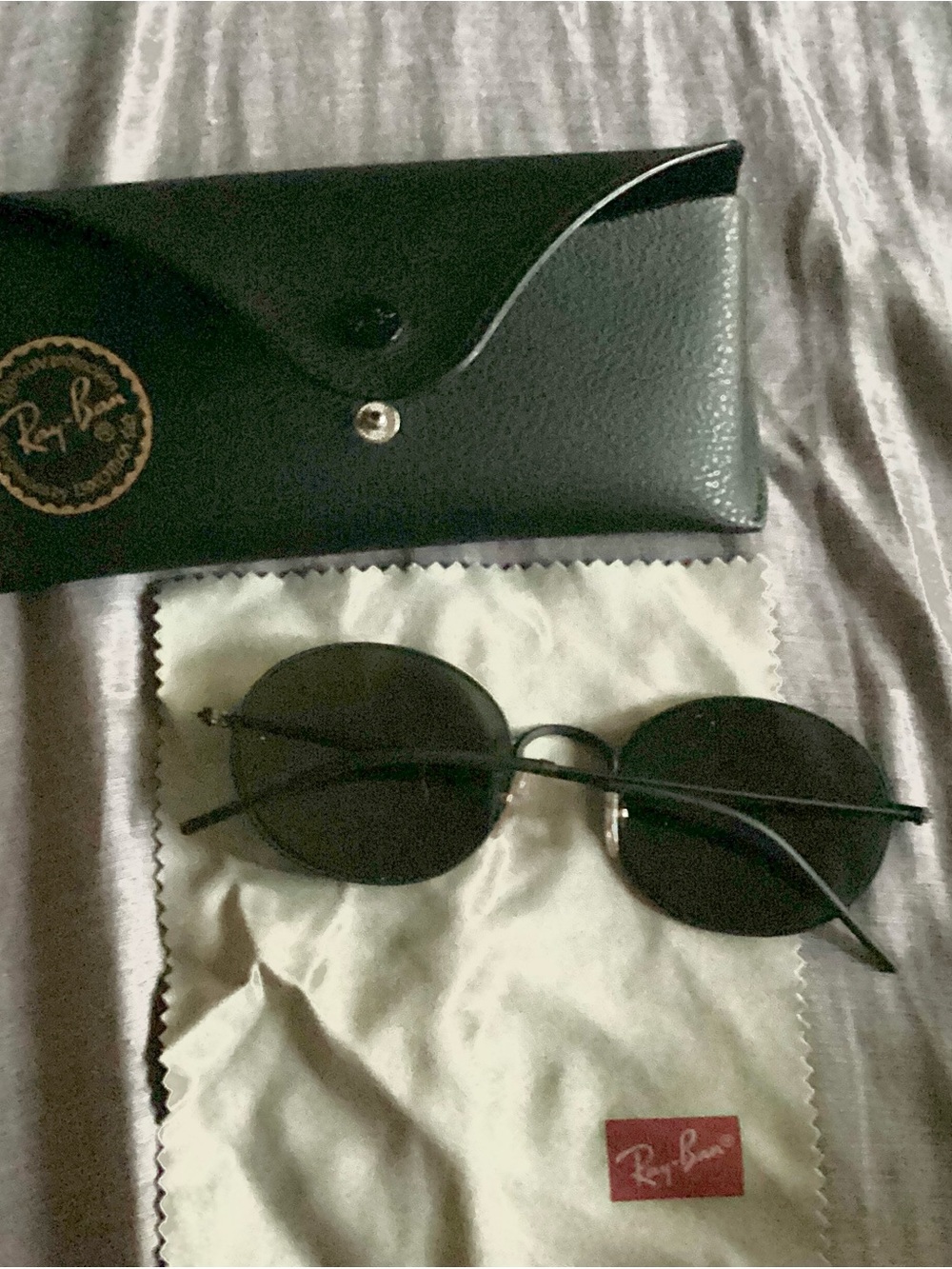 Ray-Ban Black Oval Metal Frame Sunglasses with Black Lenses